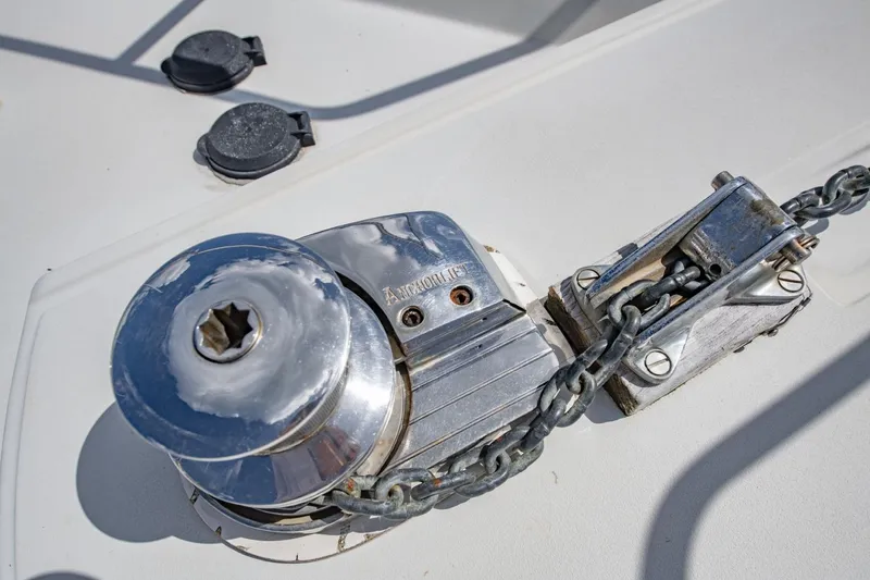 Slide: The Image of Anchor windlass on 1988 Tollycraft 44 Cockpit Motor Yacht deck. - 36
