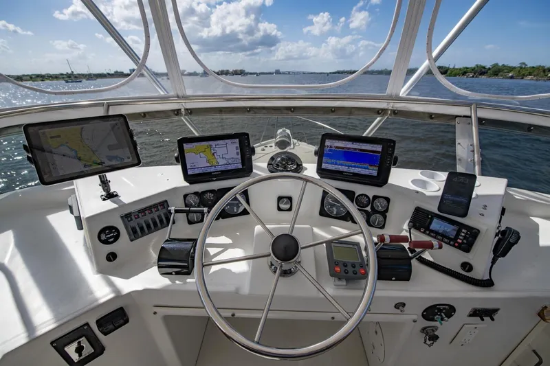 Slide: The Image of Cockpit view of 1988 Tollycraft 44 Cockpit Motor Yacht with navigation equipment. - 50