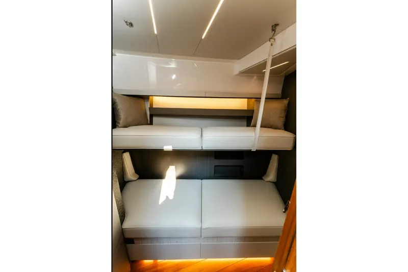 Slide: The Image of Interior of 2020 Tiara Yachts C49 Coupe featuring cozy bunk beds. - 36