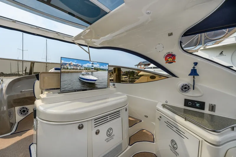 Slide: The Image of Interior of 2003 Cruisers 5470 Express yacht with TV and modern amenities. - 28