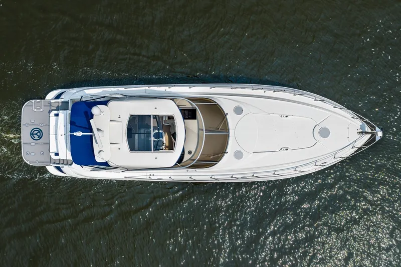 Slide: The Image of Aerial view of 2003 Cruisers 5470 Express yacht on water. - 16