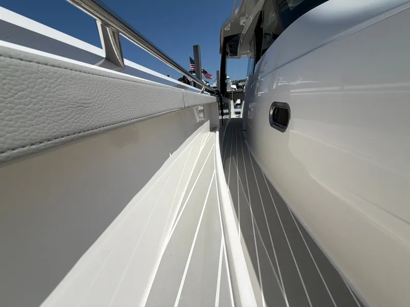 Slide: The Image of The 2026 Tiara Yachts 48 LS features a sleek deck with modern lines and high-quality materials. - 6