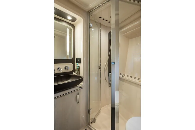 Slide: The Image of Luxurious bathroom in 2020 Azimut Fly 50 yacht with modern fixtures and glass shower. - 63