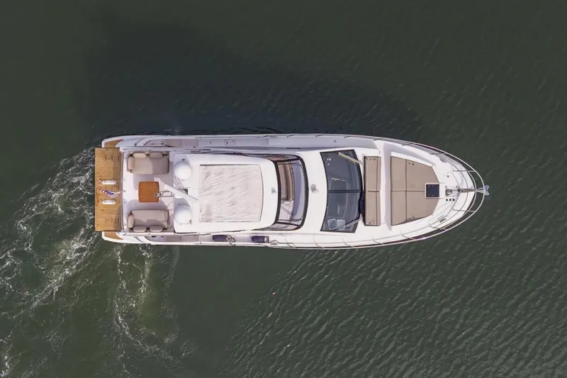 Slide: The Image of Overhead view of 2020 Azimut Fly 50 yacht cruising on water. - 3
