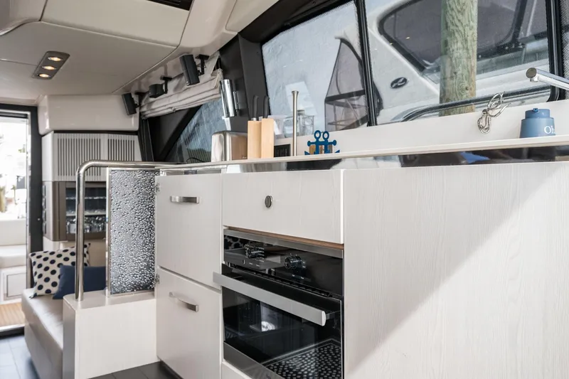 Slide: The Image of Luxurious interior of 2020 Azimut Fly 50 yacht with modern kitchen design. - 44