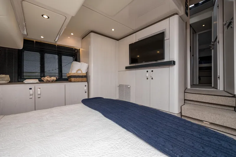 Slide: The Image of Luxurious interior of 2020 Azimut Fly 50 yacht with modern bedroom design. - 56