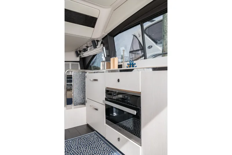 Slide: The Image of Modern kitchen interior of 2020 Azimut Fly 50 yacht with sleek cabinetry and appliances. - 45