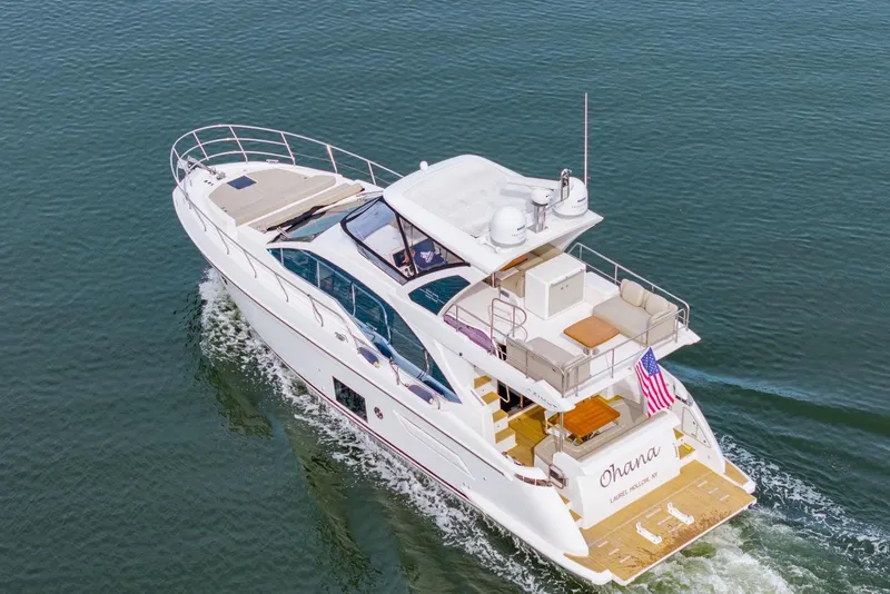 Slide: The Image of Aerial view of 2020 Azimut Fly 50 yacht cruising on calm waters. - 1