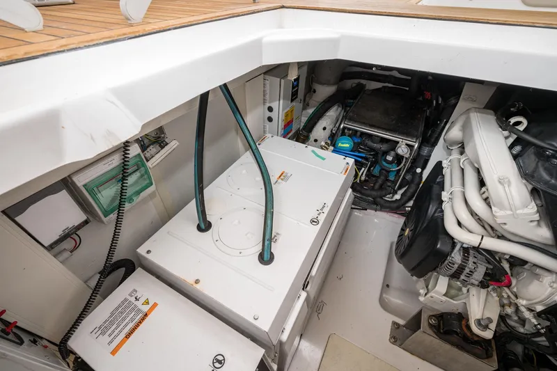 Slide: The Image of Engine compartment of 2020 Azimut Fly 50 yacht, showcasing mechanical components and systems. - 67