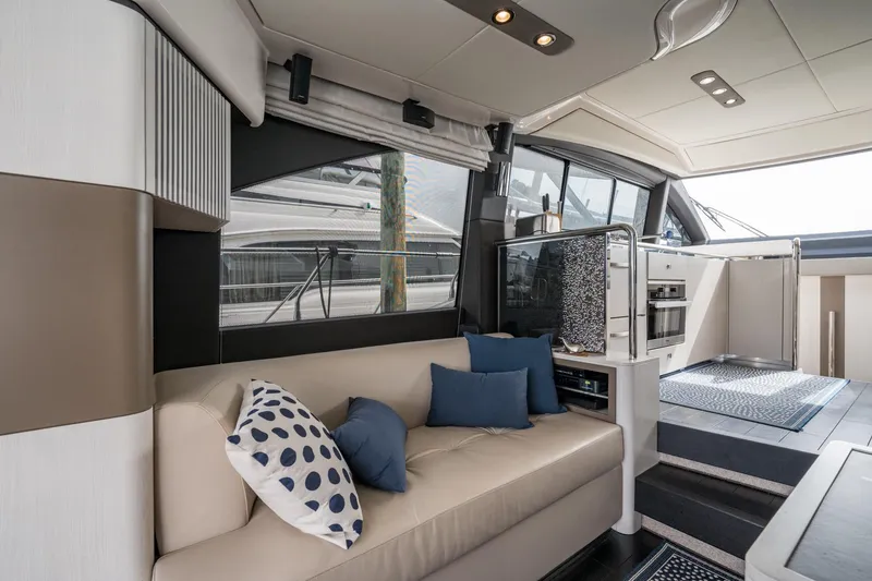 Slide: The Image of Luxurious interior of 2020 Azimut Fly 50 yacht with modern seating and elegant decor. - 40