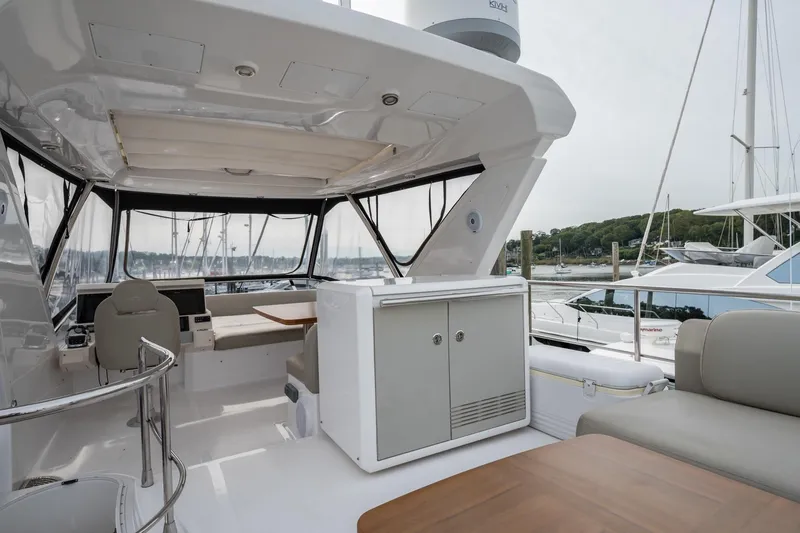 Slide: The Image of Luxurious 2020 Azimut Fly 50 yacht interior with seating and marina view. - 30