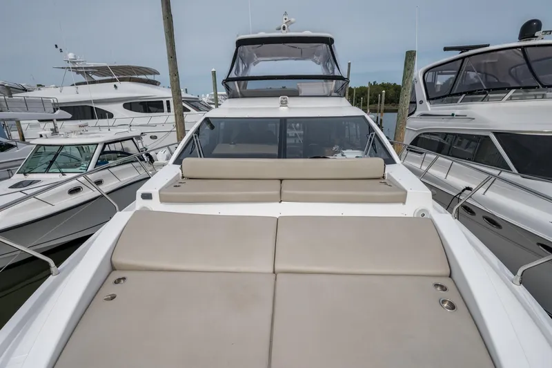 Slide: The Image of Azimut Fly 50 yacht, 2020 model, docked with spacious sunbathing area. - 21