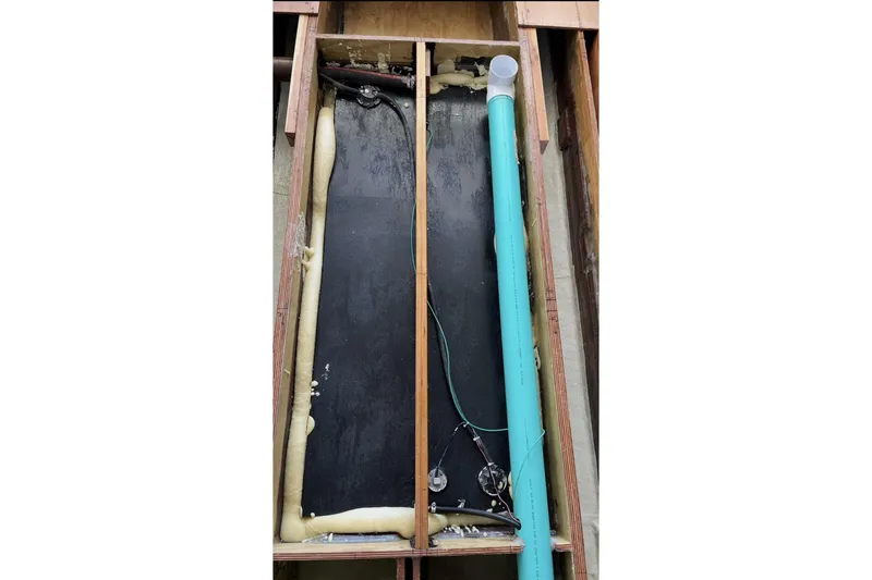 Slide: The Image of May-Craft 2000 CC 2022 boat construction showing internal components and wiring. - 14