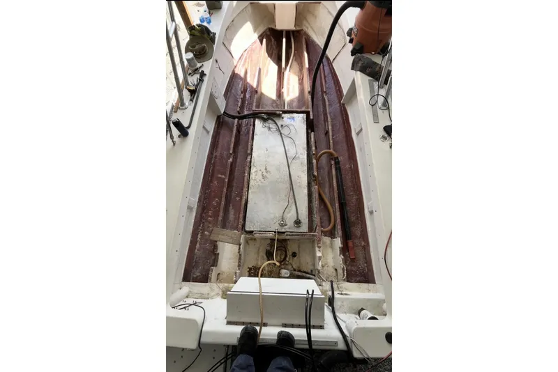 Slide: The Image of Interior view of a 2022 May-Craft 2000 CC boat under maintenance. - 10