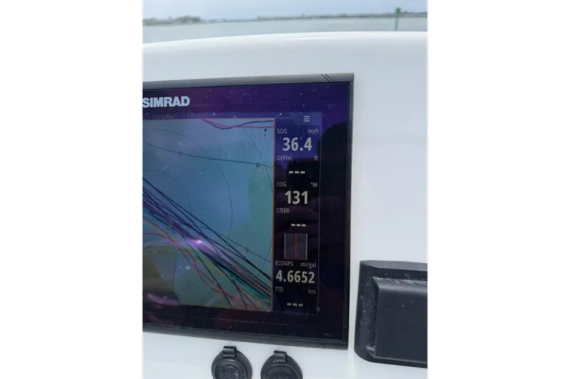 Slide: The Image of Simrad display on 2019 Yellowfin 21 Bay boat showing speed and navigation data. - 28