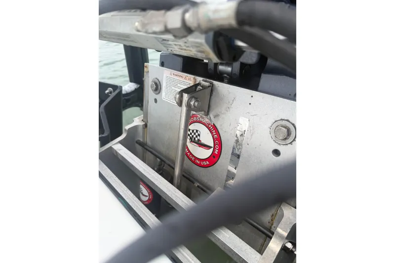 Slide: The Image of Close-up of 2019 Yellowfin 21 Bay boat machinery with a "Made in USA" label. - 26
