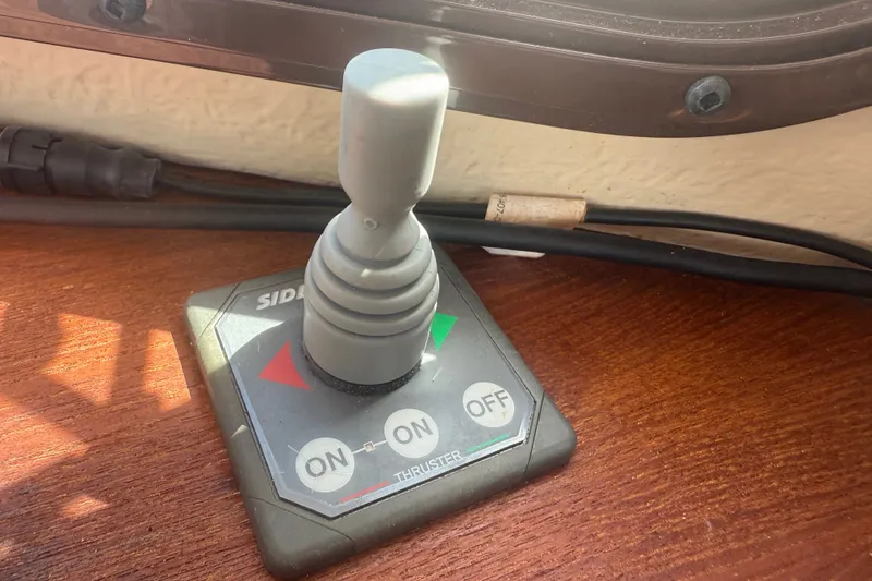Slide: The Image of Joystick control panel on 2012 Ranger Tugs R-21 EC boat, featuring thruster controls. - 39