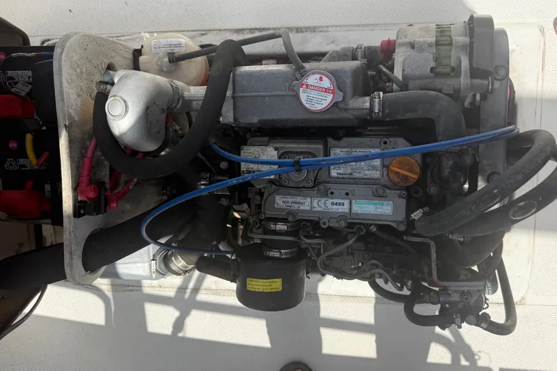 Slide: The Image of Engine of a 2012 Ranger Tugs R-21 EC boat, viewed from above. - 32