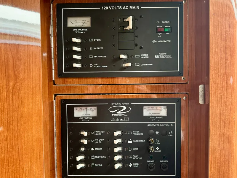 Slide: The Image of Electrical panel setup in a 2012 Regal 3550 Cuddy. - 44