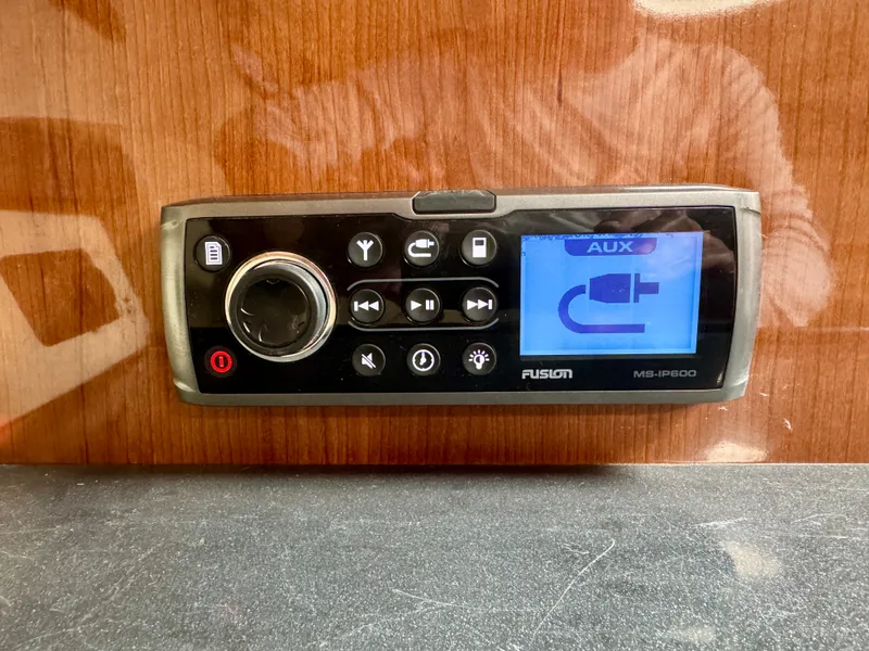 Slide: The Image of Fusion audio system in a 2012 Regal 3550 Cuddy boat. - 45