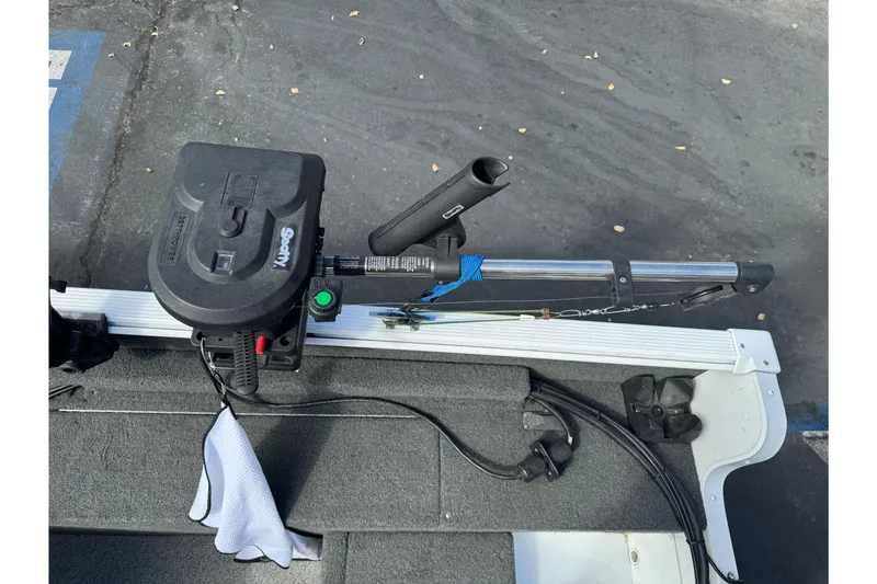 Slide: The Image of 2011 Lund 1625 Rebel XL Sport boat with mounted fishing rod holder. - 8