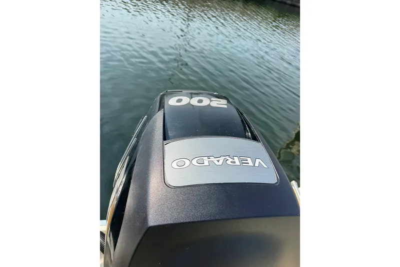 Slide: The Image of Outboard motor on a 2017 Scout 215 XSF boat, featuring a Verado engine. - 15