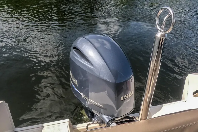 Slide: The Image of Outboard motor on 2023 White Shark 210CC boat, Yamaha 150 horsepower engine. - 10
