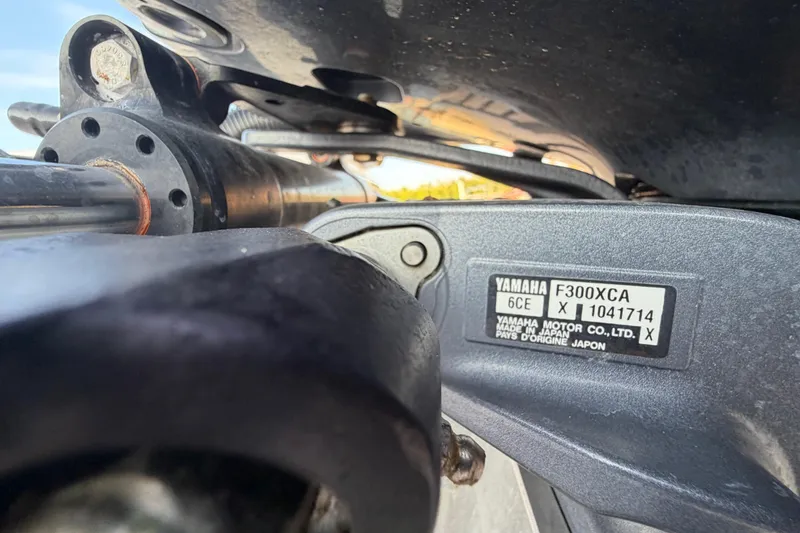 Slide: The Image of Close-up of Yamaha F300XCA engine on 2018 Robalo 246 Cayman boat. - 38