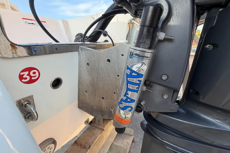 Slide: The Image of 2018 Robalo 246 Cayman boat with Atlas hydraulic jack plate and engine mount. - 37