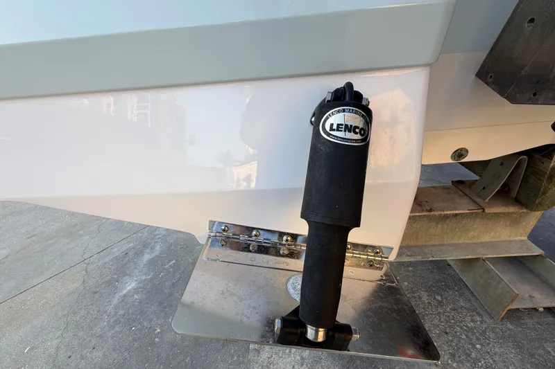Slide: The Image of 2018 Robalo 246 Cayman boat with Lenco trim tab actuator. - 36