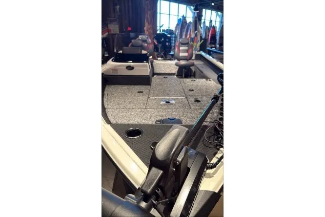 The Image of 2026 Ranger VS1682SC Angler boat interior with seating and fishing equipment. - 0