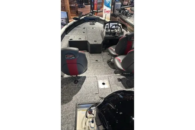 Slide: The Image of 2026 Ranger VS1682SC Angler boat interior with seating and steering console. - 1