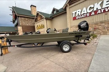The Image of 2026 Tracker Grizzly 1754 SC boat displayed outside Tracker Boats & ATVs store. - 0