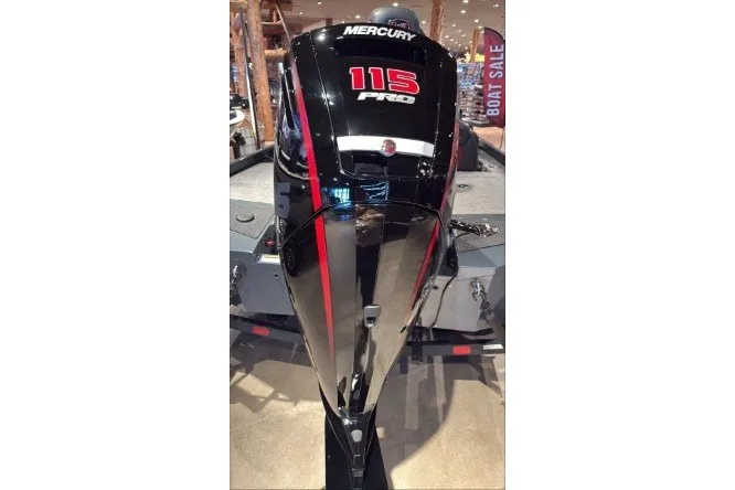 Slide: The Image of 2026 Ranger RT188P boat with Mercury 115 Pro outboard motor displayed at a boat sale. - 3