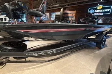 The Image of 2026 Ranger RT188P boat displayed in showroom with Mercury branding. - 0