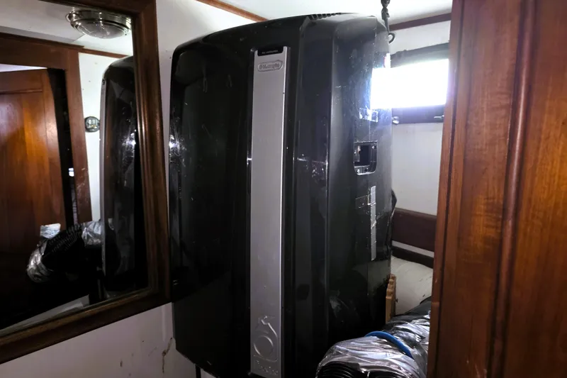 Slide: The Image of Interior of 1978 CHB 34 trawler with portable air conditioning unit installed. - 9