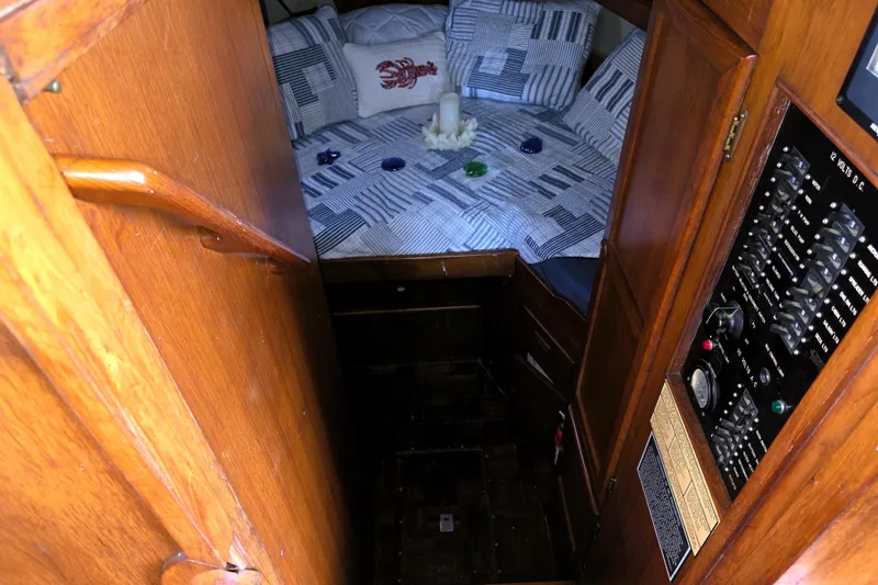 Slide: The Image of Interior of 1978 CHB 34 trawler with cozy cabin and control panel. - 8