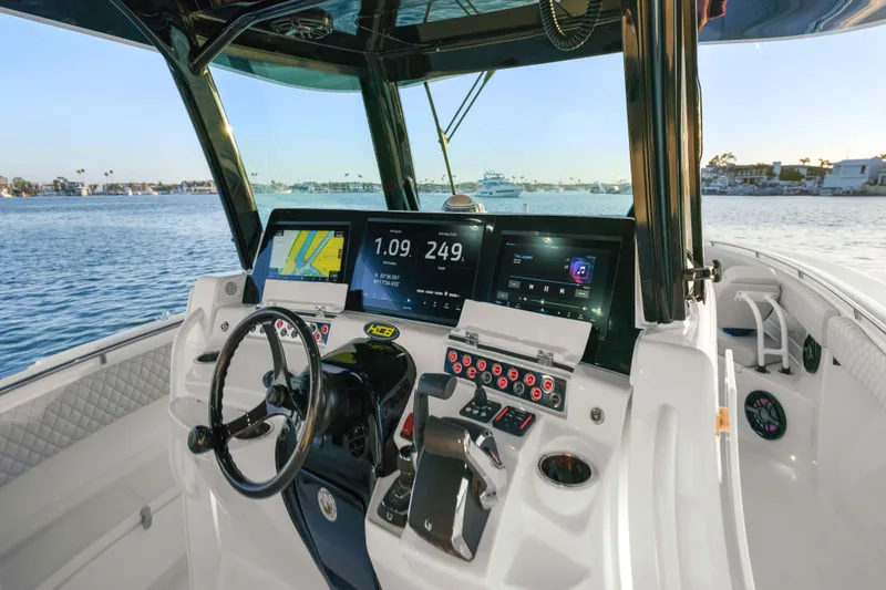 Slide: The Image of The cockpit of the 2026 HCB 42 Lujo features modern navigation systems and sleek design. - 44