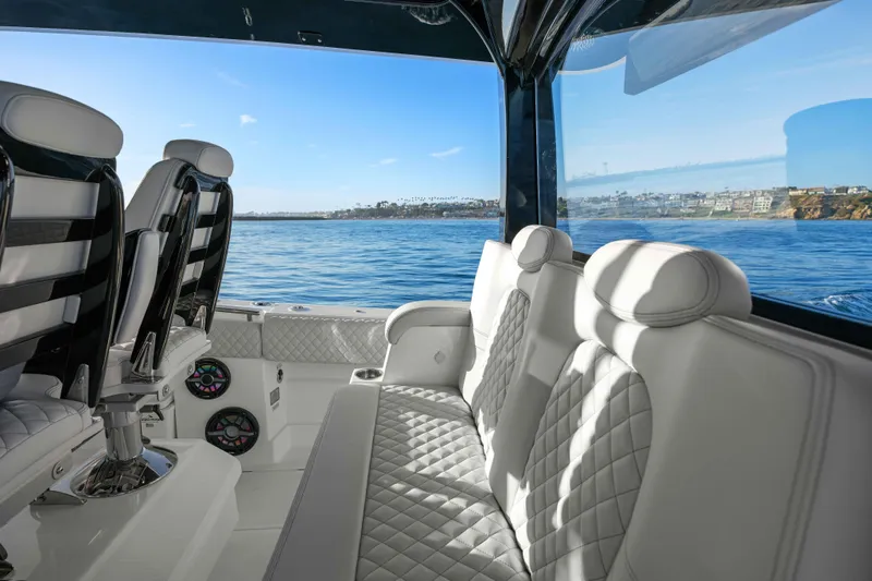 Slide: The Image of Luxurious seating in the HCB 42 Lujo with views of the sea and coastline. - 32