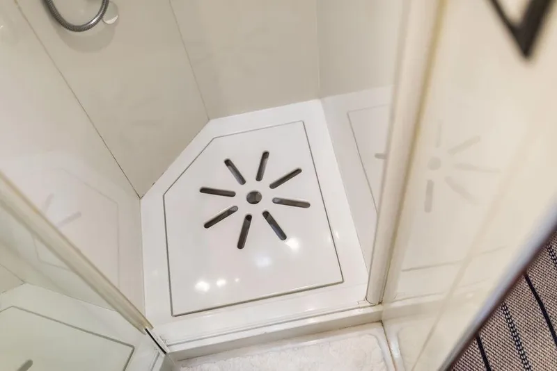 Slide: The Image of Shower area in 2004 Ta Chiao Custom Pilothouse Cutter yacht, featuring modern drainage design. - 41