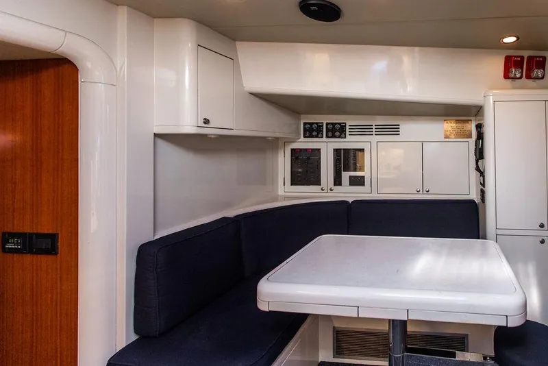 Slide: The Image of Interior of 2004 Ta Chiao Custom Pilothouse Cutter with seating and control panels. - 50