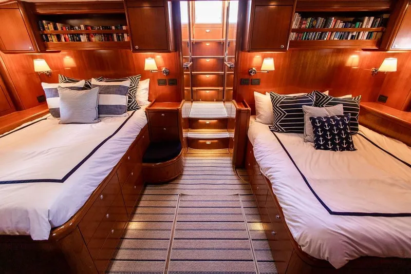Slide: The Image of Luxurious 2004 Ta Chiao Custom Pilothouse Cutter cabin with twin beds and nautical decor. - 33