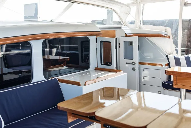 Slide: The Image of Luxurious interior of 2004 Ta Chiao Custom Pilothouse Cutter with elegant wood finishes. - 11