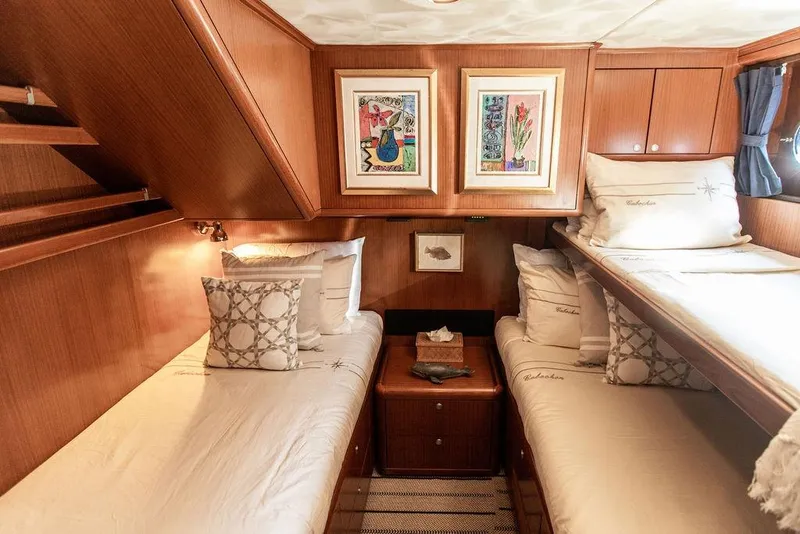Slide: The Image of Luxurious 2004 Ta Chiao Custom Pilothouse Cutter cabin with twin beds and elegant decor. - 43