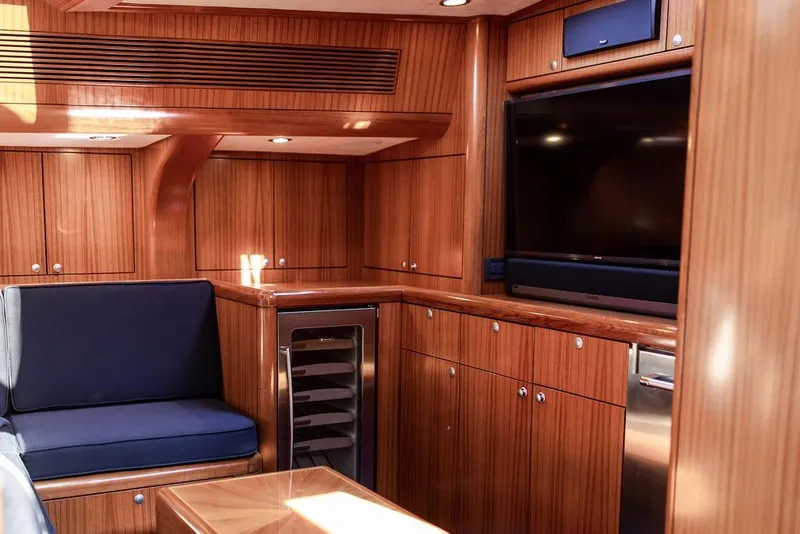 Slide: The Image of Luxurious 2004 Ta Chiao Custom Pilothouse Cutter interior with wood paneling and modern amenities. - 31
