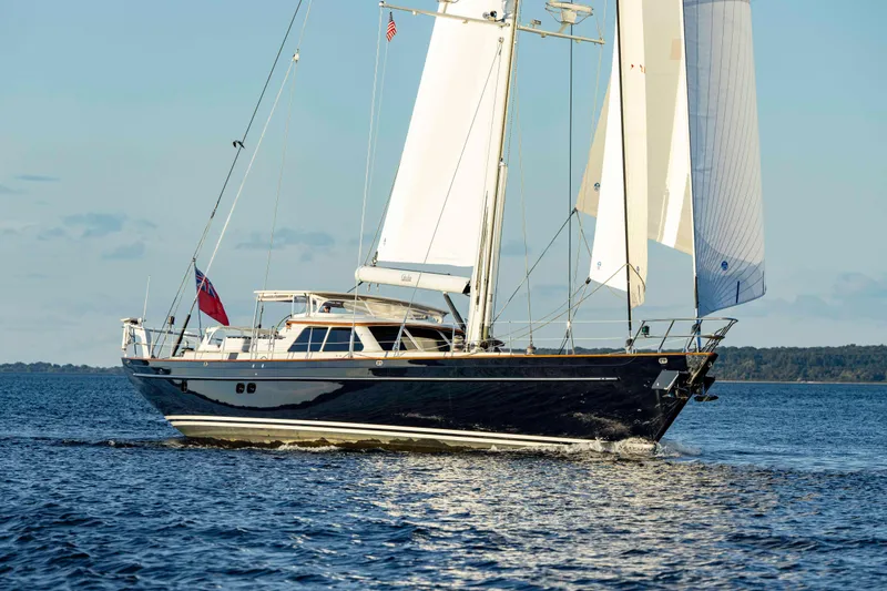 Slide: The Image of Sailing on open water, 2004 Ta Chiao Custom Pilothouse Cutter with full sails and elegant design. - 1