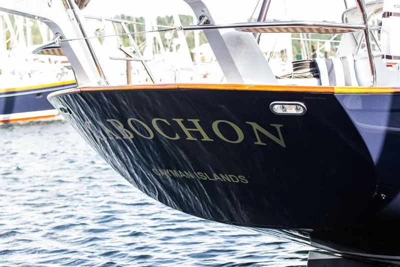 Slide: The Image of 2004 Ta Chiao Custom Pilothouse Cutter docked, Cayman Islands registration visible. - 21