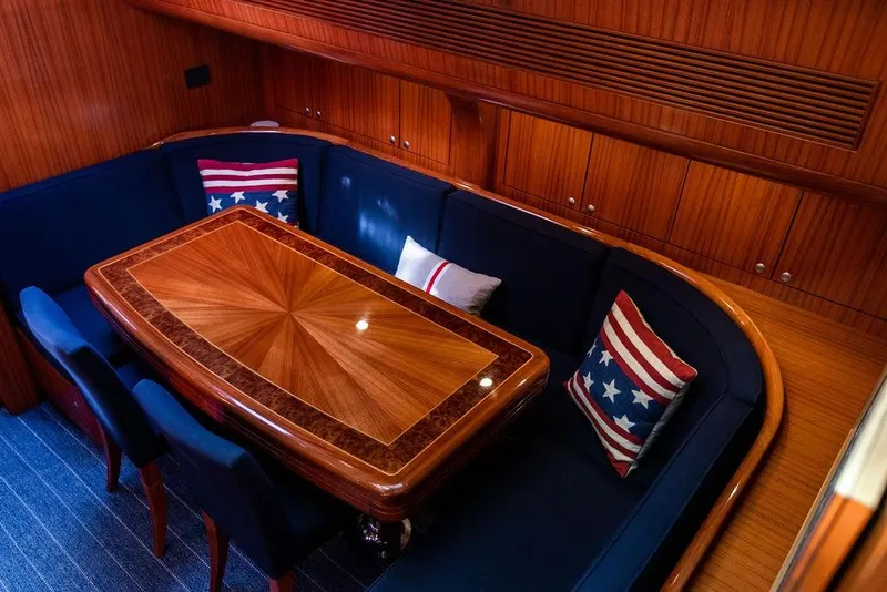 Slide: The Image of Luxurious 2004 Ta Chiao Custom Pilothouse Cutter interior with elegant wood dining area. - 30