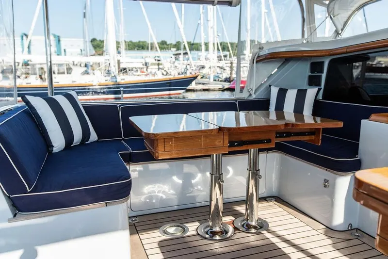 Slide: The Image of Luxurious 2004 Ta Chiao Custom Pilothouse Cutter with elegant seating and polished wood table. - 9