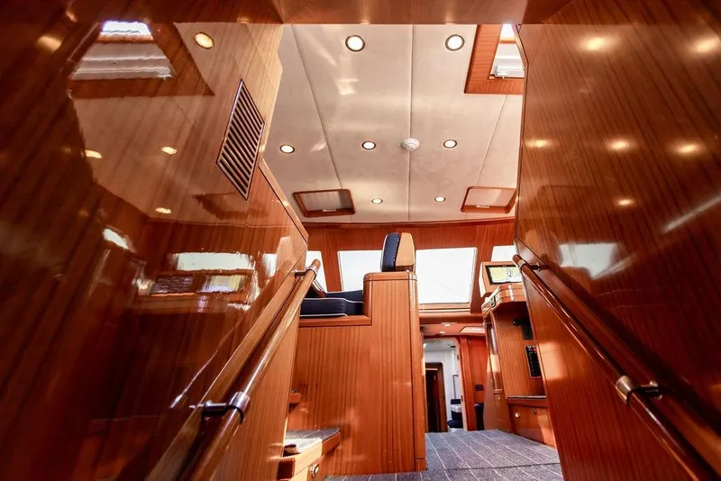 Slide: The Image of Luxurious interior of 2004 Ta Chiao Custom Pilothouse Cutter with polished wood and modern lighting. - 28